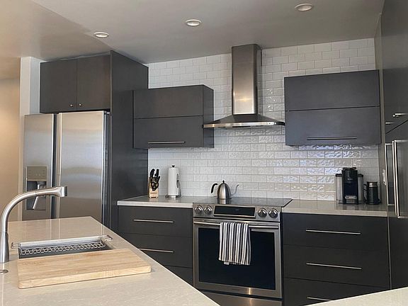 Kitchen with large pantry area, equipped with everything you might need