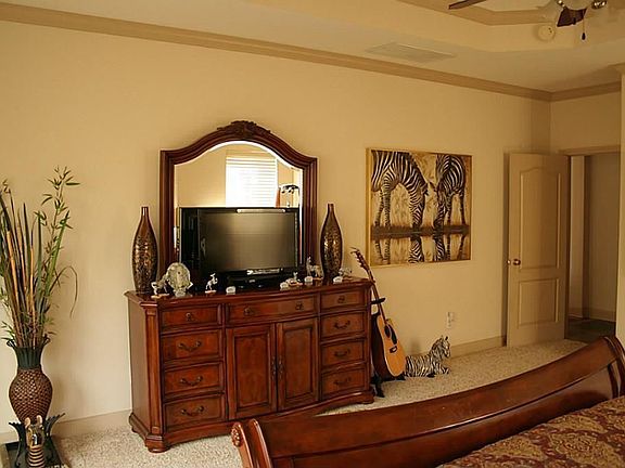 Look at all this Furniture that fits in this Master Retreat!