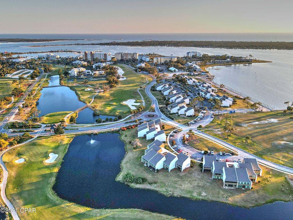 Aerial of Legend Villas Condos w/pond in back