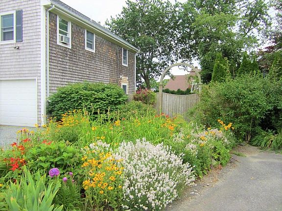 Lovely flowers at the garden gate