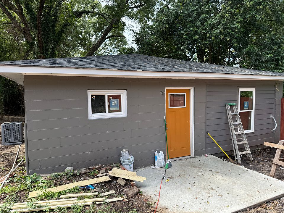 This garage added in the 1960s has been turned into a two-bed, one-bath efficiency unit.