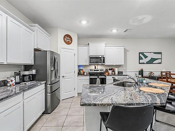 4th image of 3817 STORMY THISTLE PLACE
