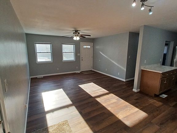 Looking at front door. Dining room.
