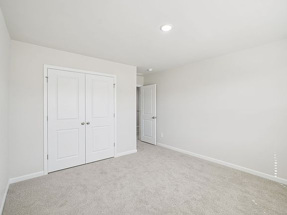 Secondary bedroom in the Taylorsville floorplan at a Meritage Homes community in Garner, NC.