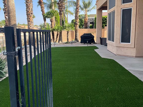 Large Artificial Turf Flat backyard...grass is always green and no mowing!