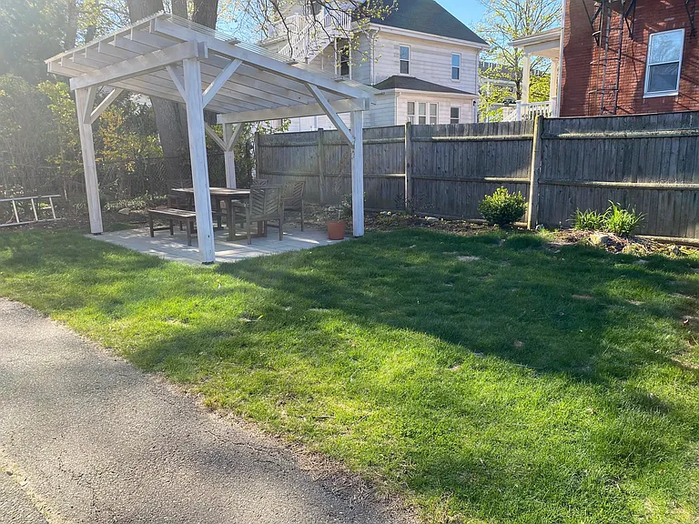 Shared backyard with pergola