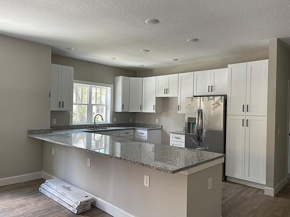 Kitchen with plenty of storage and all the appliances Coming Soon!