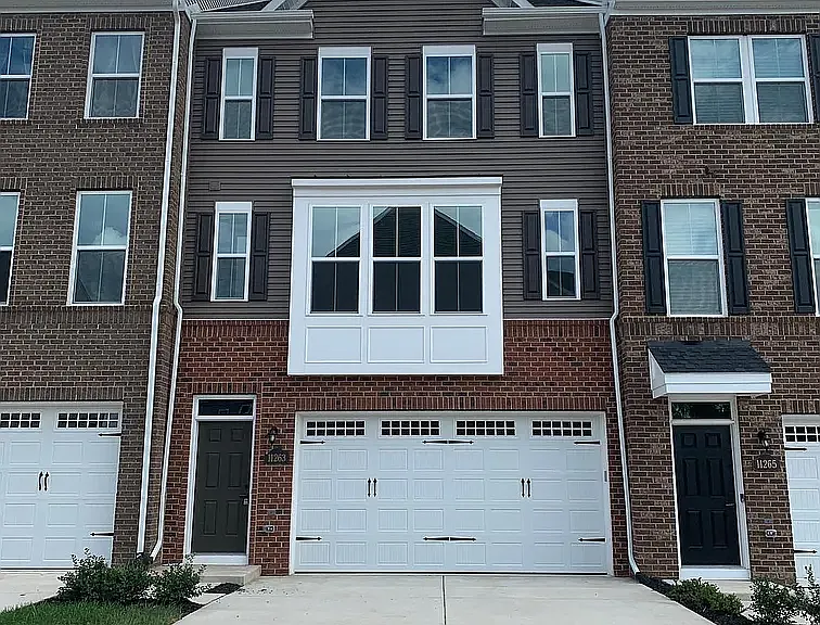 Outside view of Garage door and Entrance