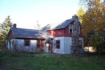 Make It Yours! Home & garage on 1.4 acres. Older 1.5 story farm home with basement. It will take som