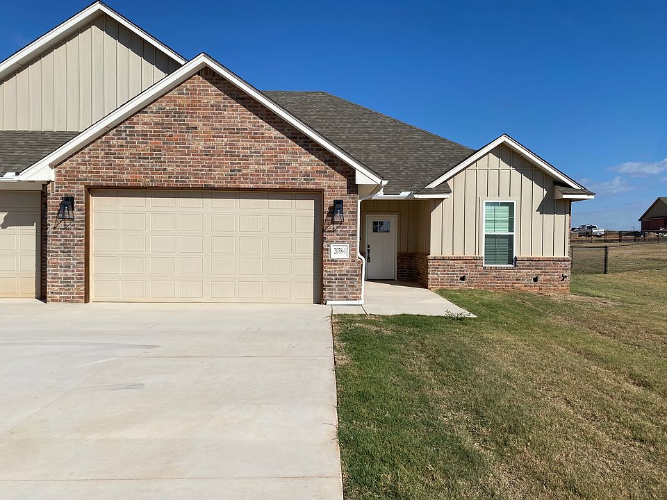Front of Unit with 2 car Garage