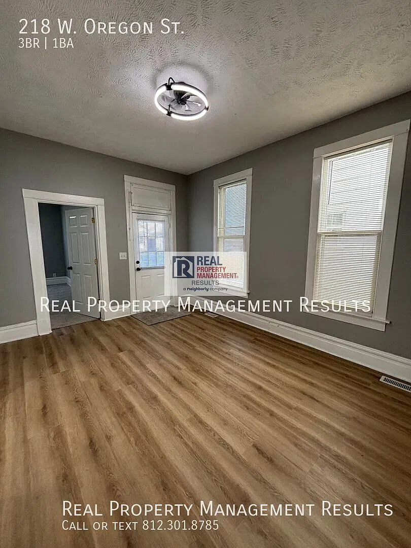 Versatile Home with Flexible Living Space & Fenced Backyard — Photo 3