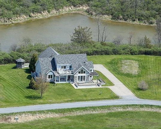 Aerial of home with conservation area behind