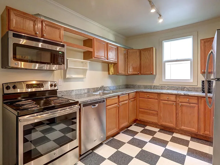 Lots of cabinet storage, plenty of counter top space, and two refrigerators!