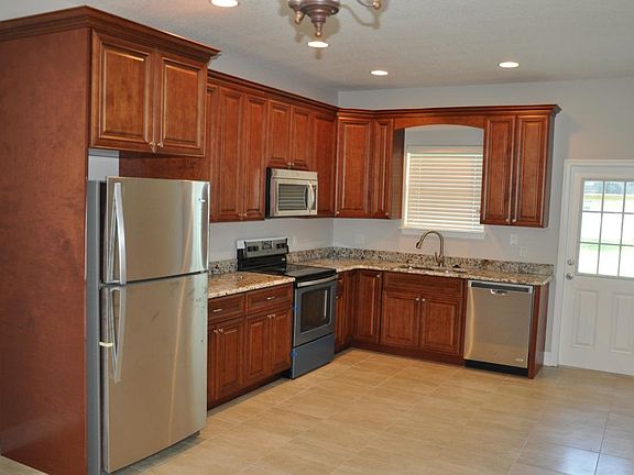 Granite countertops and stainless steel appliances