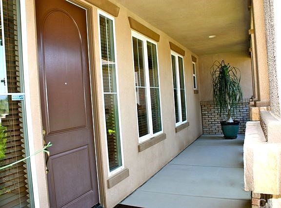 Nice Porch covered porch area with brick facade