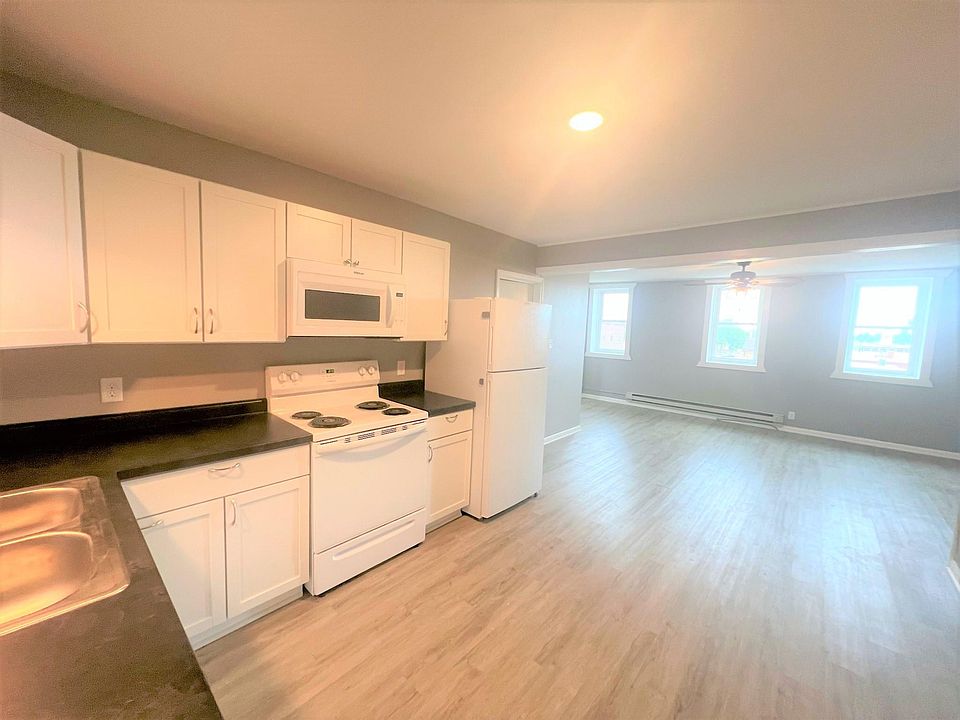 Newly remodeled kitchen -windows face main street
