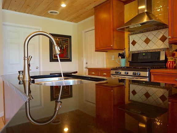 Laundry room door on left