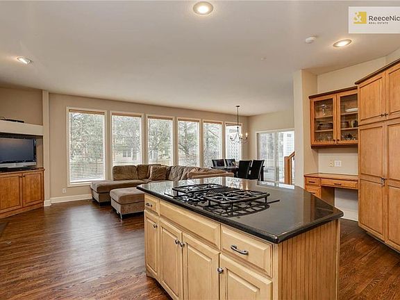 Newly refinished hardwoods throughout main level.