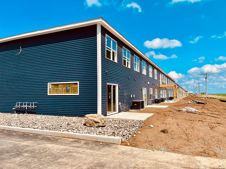 Townhouse and rear units offering patio/ balcony