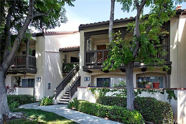 Upper level unit overlooking lush trees and green belt!