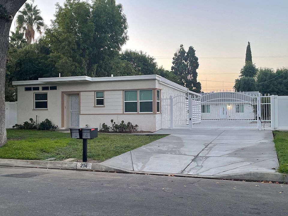 Front with driveway gate