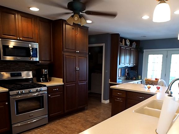 Kitchen opens to living area