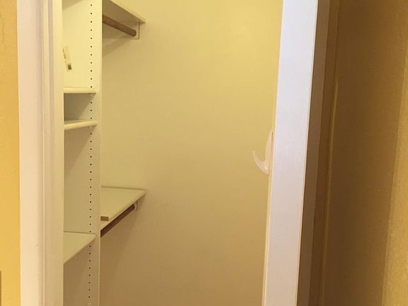 Smaller bedroom walk-in closet