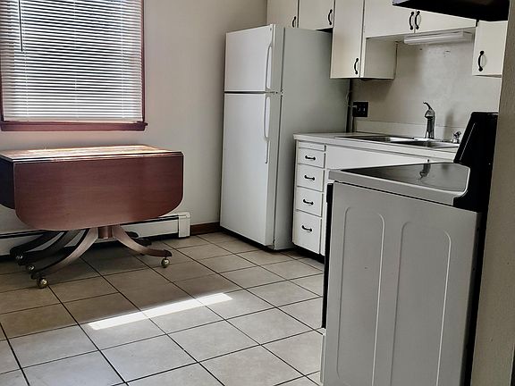 3rd image of 310-312 E 5th St