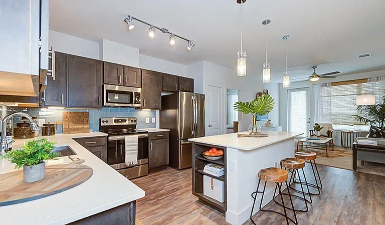 Open Floor Plan - Kitchen Island open to Living Room.