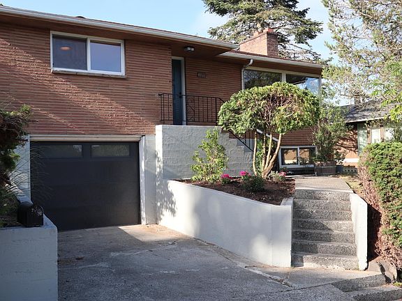 One car garage with driveway parking