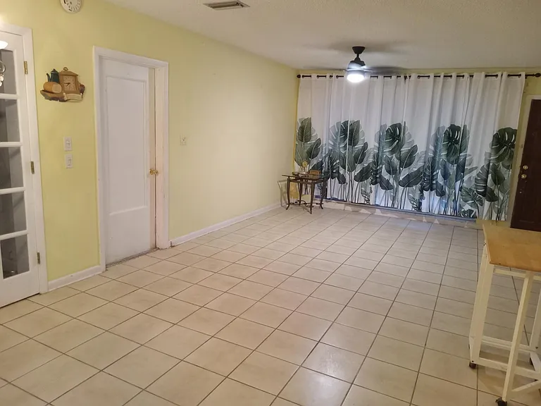 Living room space without the sectional couches.