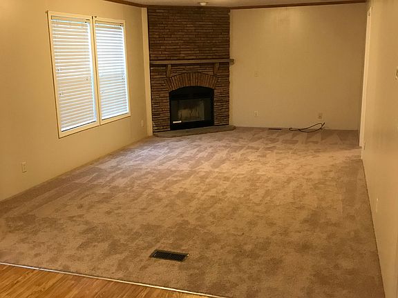 Den area with fireplace 