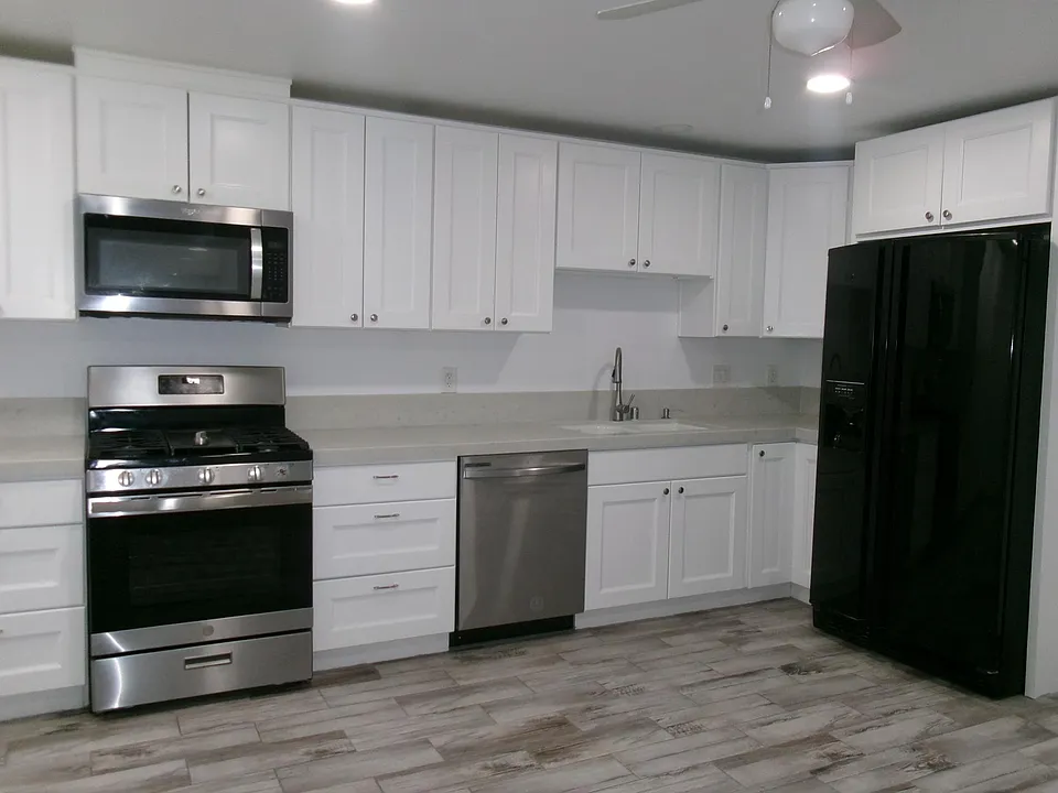 Kitchen with refrigerator