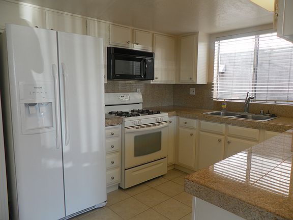 Kitchen includes d/w, fridge, oven and microwave
