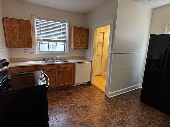 Kitchen includes appliances and dishwasher