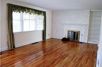 LR with hdwd flrs, fireplace & built-in shelving