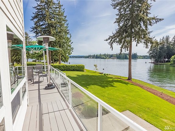 Trees, water and mountain view.  Lots of privacy and room to roam on this property