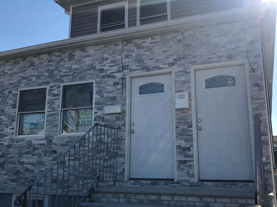 Front entrance of the house. On the right aide is the second floor entrance.