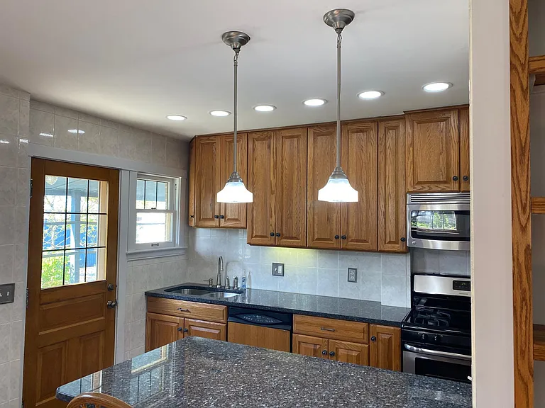 Blue Pearl Granite, Oak cabinets, stainless steel appliance