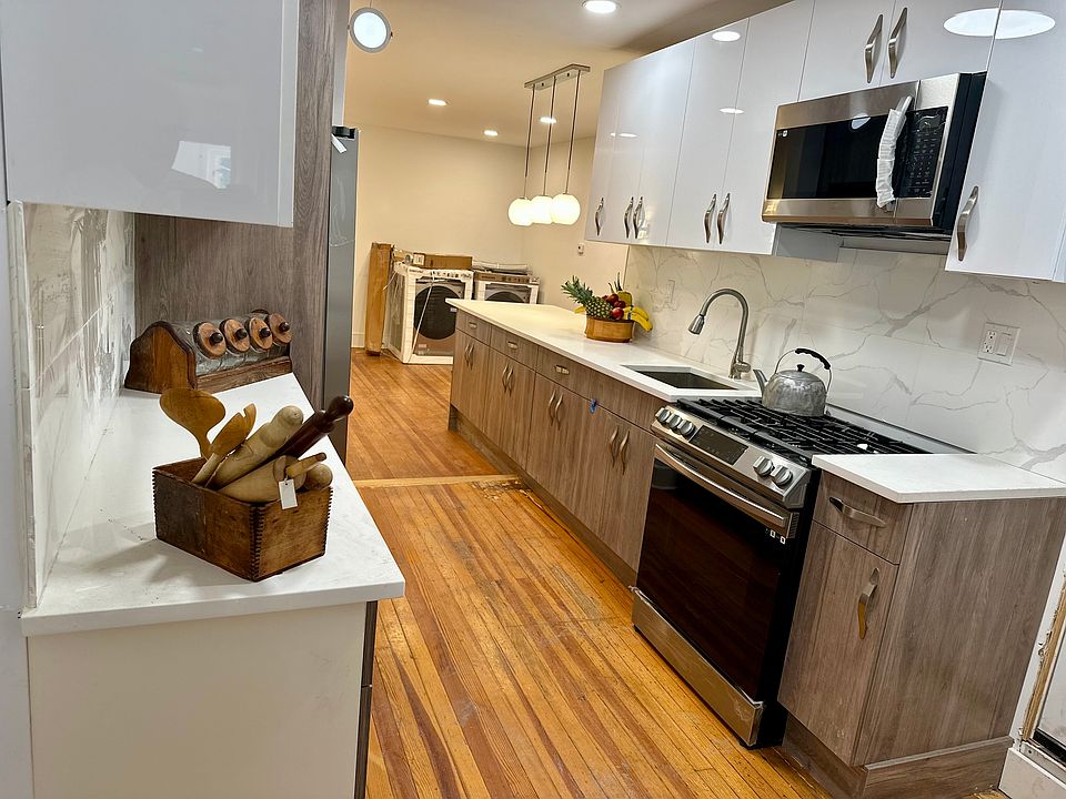 Renovated kitchen with best rated Brand : Stove, side by side large capacity refrigerator / freezer.