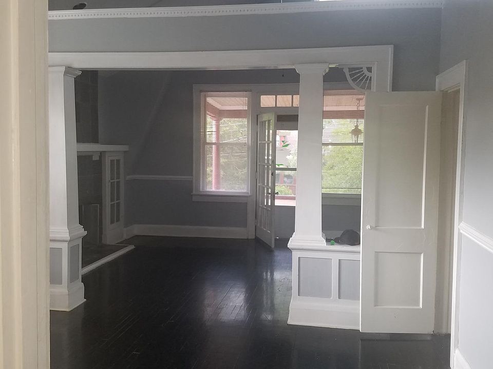 Dining room looking through living room to private porch. 