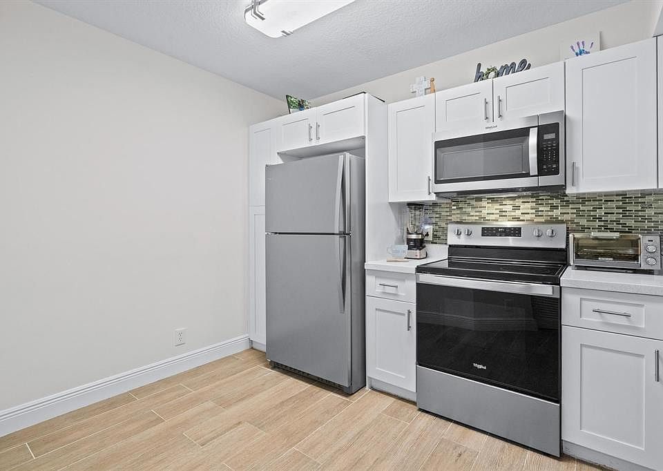 1st image of 8851 S Wiles Road #305
