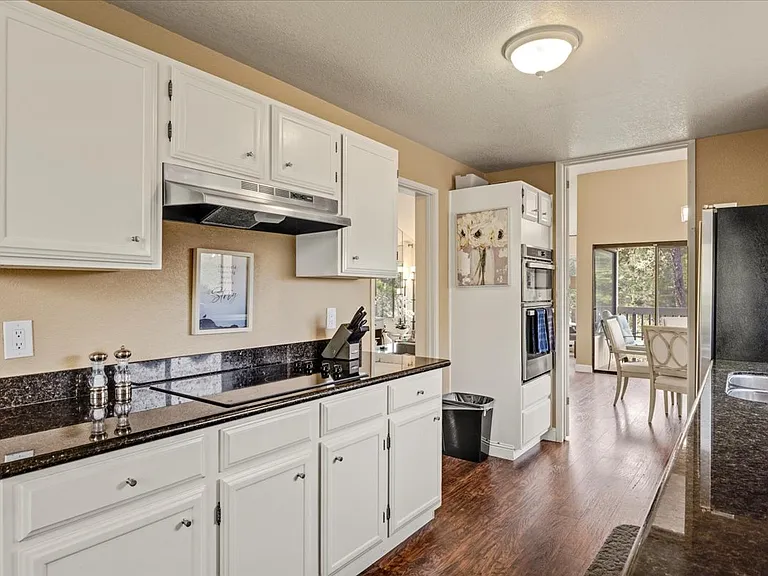 Large remodeled kitchen with top of the line GE appliances. Large size oven with built in Micro wave and convection cooking. Large refrigerator /freezer and new GE dishwasher and stove top.