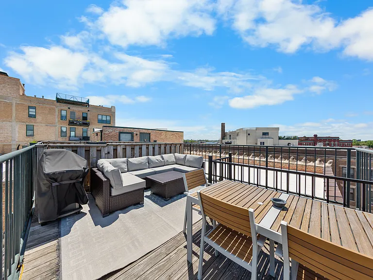 Dedicated rooftop patio with access directly from the apartment via the spiral staircase.