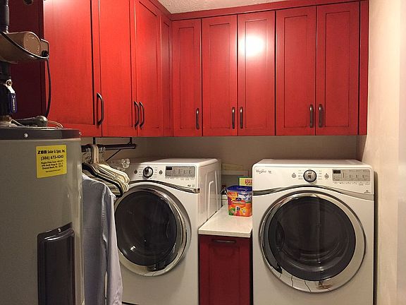 Laundry room w/ custom cabin