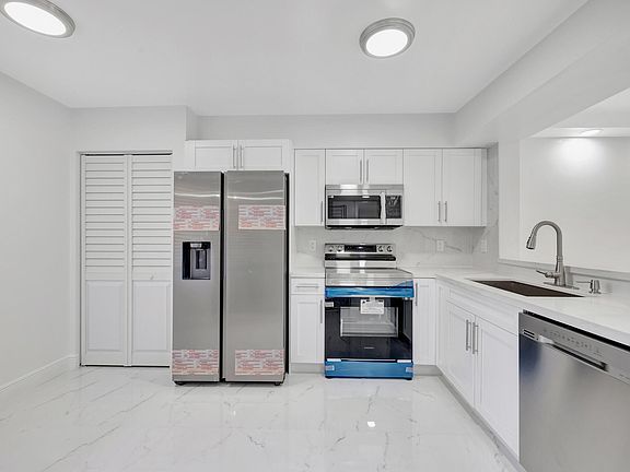 5th image of 7320 Amberly Lane #105