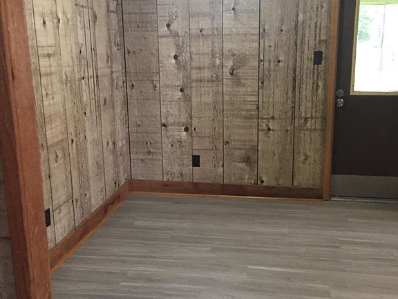 Kitchen area with back door in view