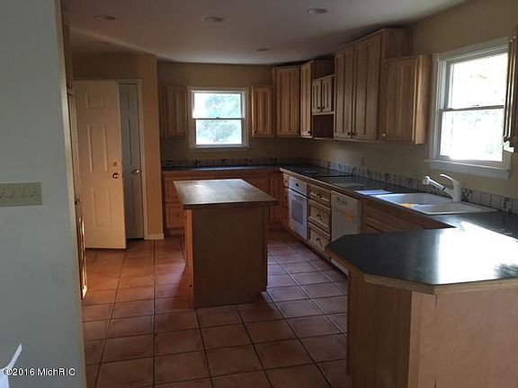 3rd image of 9712 E 13th St