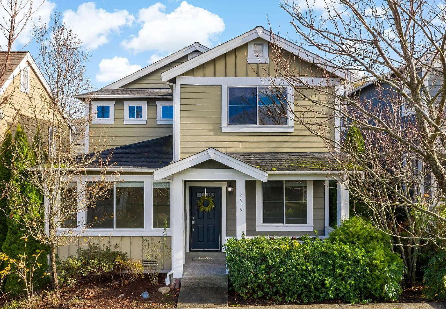 Enjoy this immaculate home in a park-like setting showcasing the beauty of the Issaquah Highland ... — Photo 1