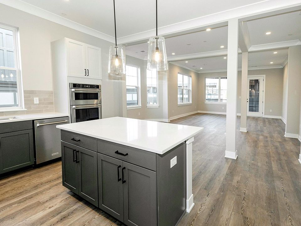 Kitchen View to Dining Room and Living Room